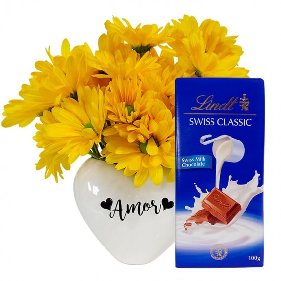 White Heart Arrangement with Yellow Daisies and Lindt Swiss Classic