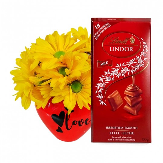 Arranjo Coração Vermelho com Margaridas Amarelas e Lindt Milk