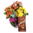 Arrangement with Mini Roses Colorful and Lindt Hazelnut Chocolate Bar
