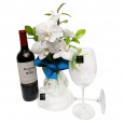 Arrangement with White Orchids, Casillero del Diablo Wine and Glasses