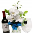 Arrangement with White Orchids, Casillero del Diablo Wine and Glasses