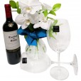 Arrangement with White Orchids, Casillero del Diablo Wine and Glasses