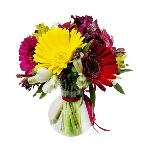 Gerberas and astromeliads arrangement in glass vase