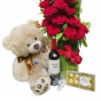 Arrangement with Colombian Roses, Teddy Bear, Wine, Glass and Ferrero Rocher
