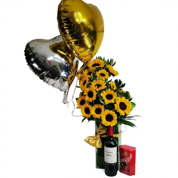 Splendid Sunflower Arrangement with Balloons. Lindt Chocolates and Casillero del Diablo Wine